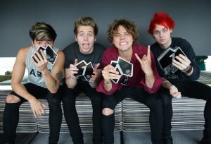 OCTOBER 12, 2014: SYDNEY, NSW. (L-R) Calum Hood, Luke Hemmings, Aston Irwin and Michael Clifford of Australian boy band '5 Seconds of Summer' (5SOS) pose during a photo shoot at the Intercontinental Hotel in Sydney, New South Wales. (Photo by Cameron Richardson / Newspix) Contact Email: newspix@newsltd.com.au Contact Web URL: www.newspix.com.au Contact Email: newspix@newsltd.com.au